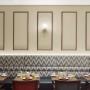 Sitzbereich im Restaurant im EST Grand Hotel Savoy in Budapest