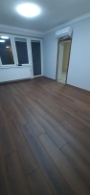Laminált burkolás